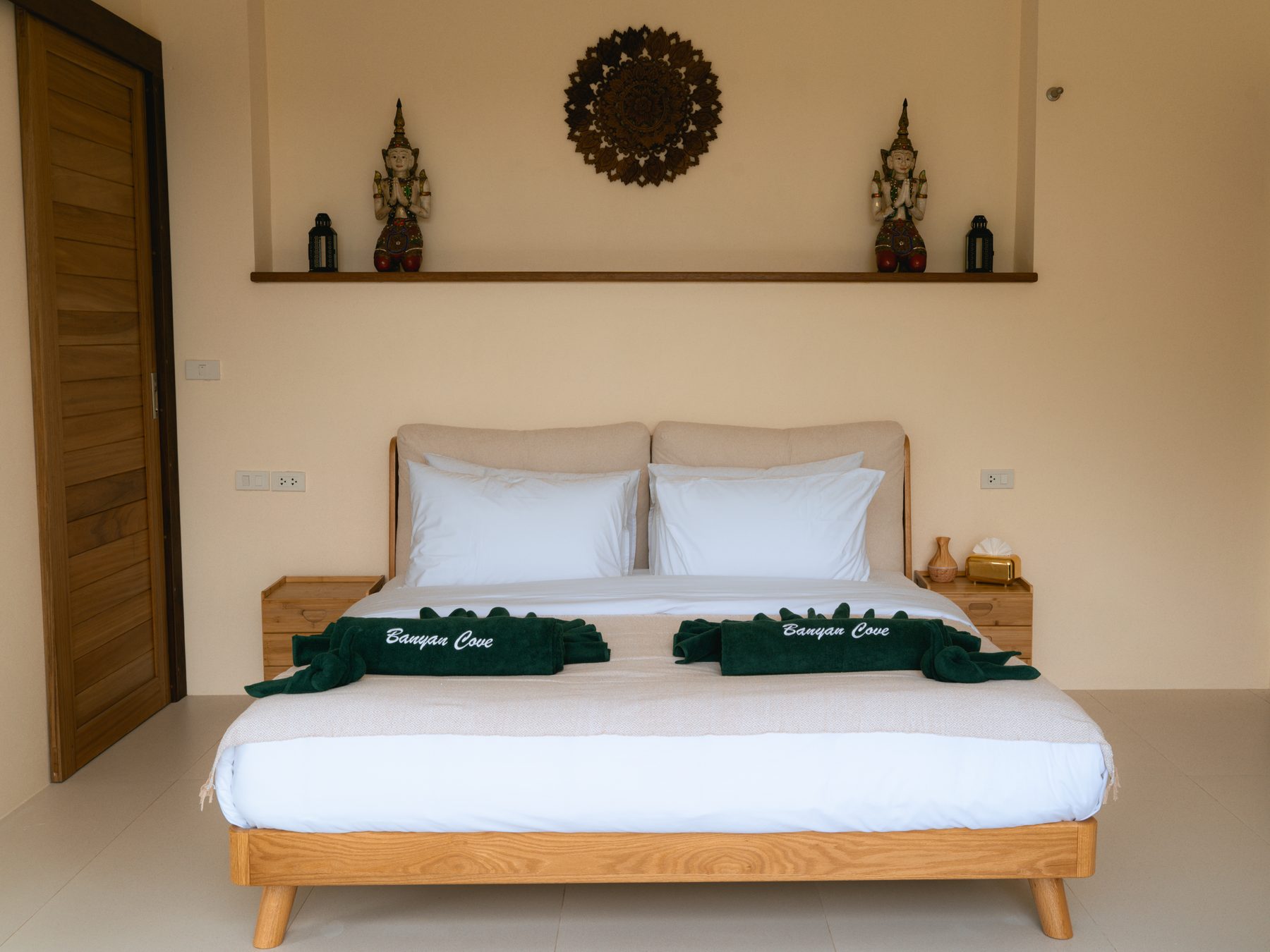 Primary ensuite bedroom with balcony