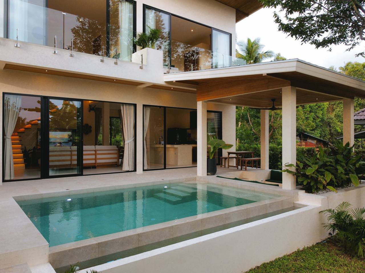 The villa and pool by day